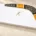 Illustration of a Golden Sun wooden boomerang on a white gift box with a gold logo.