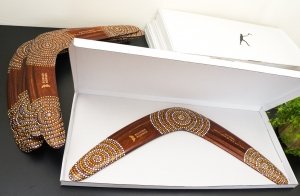 Personalized boomerangs are packed to white gift boxes as coorporate gifts