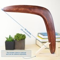 Dark Brown Cedar wooden boomerang on a display stand showing 18 inch (46 cm) dimensions.