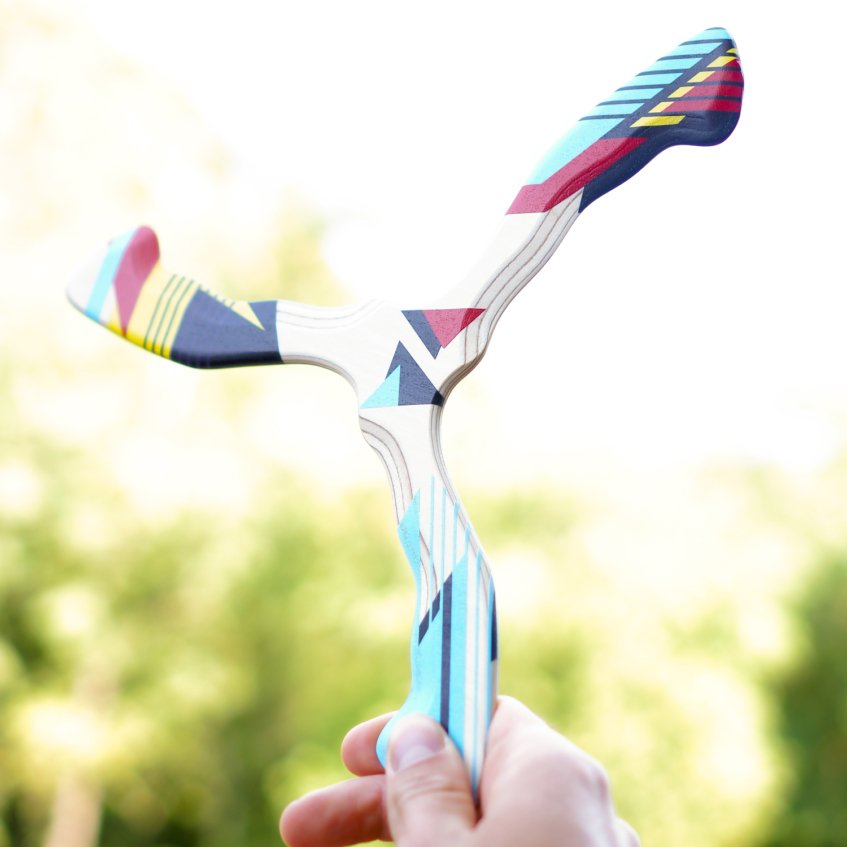 hand-holding-hurricane-boomerang-grip-pov First-person view of hand holding the Hurricane wooden boomerang ready to throw.