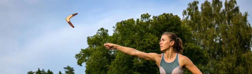 A Golden Swallow boomerang in the air just after an outdoor throw